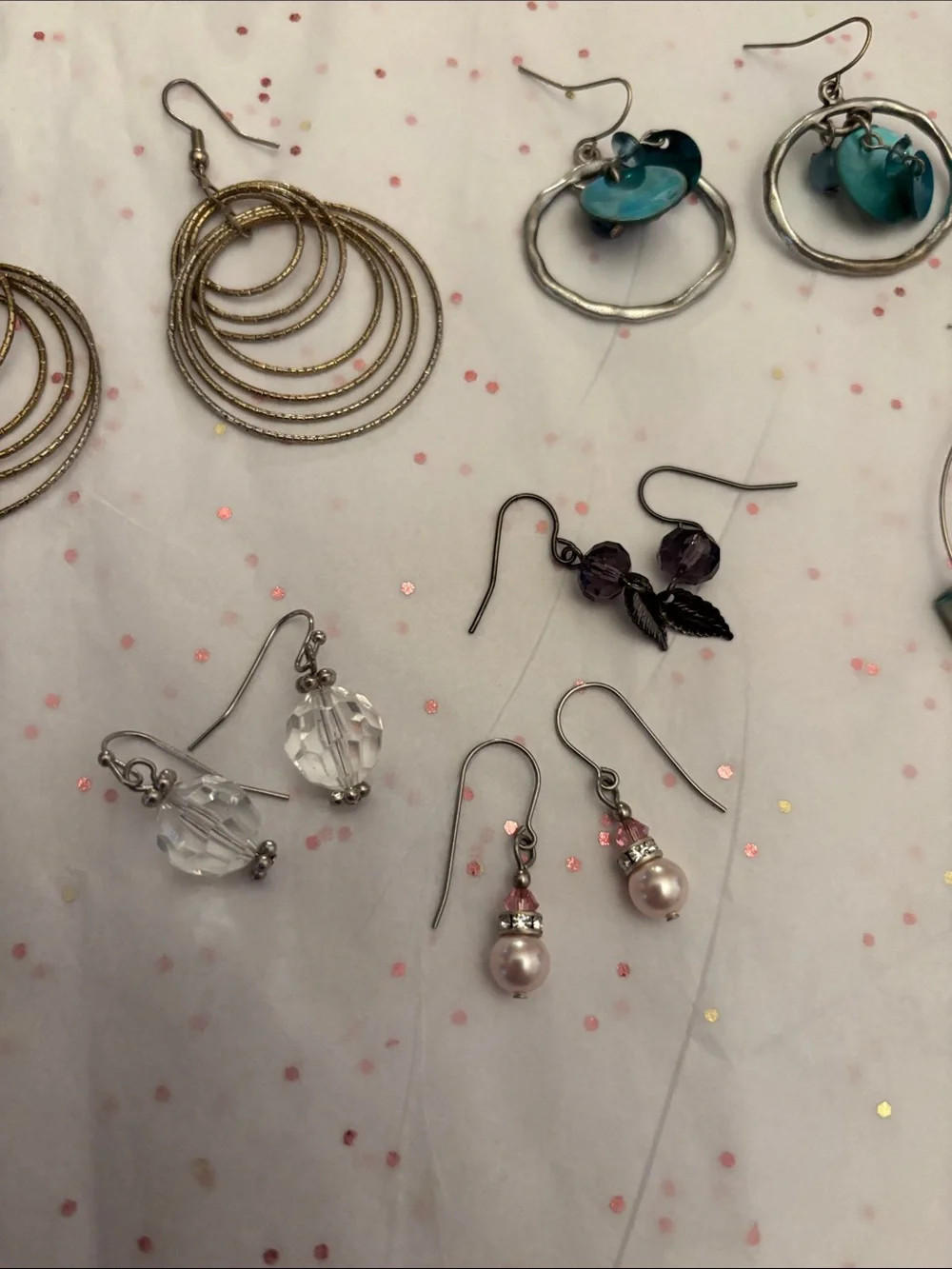 10 pair of assorted‎ earrings.